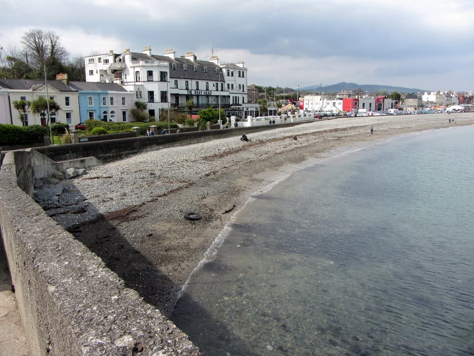 Bray seafront with its pebble beach, promenade and a row of Victorian terraces and hotels.